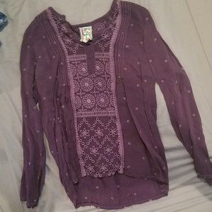Purple long sleeved blouse